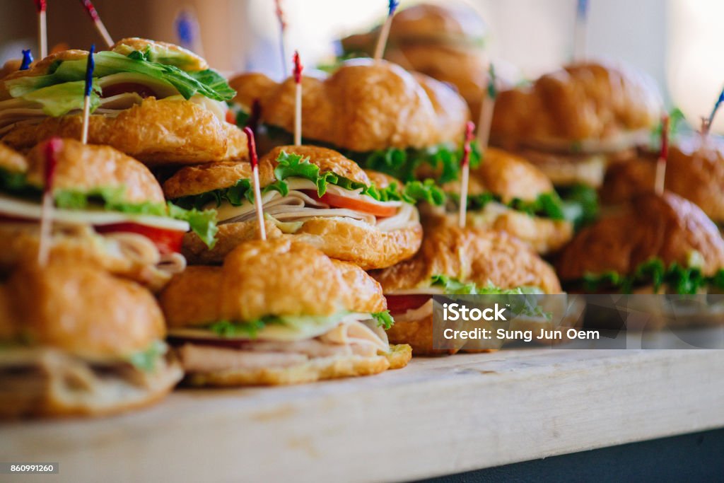 Croissant Sandwich Stack Stack of croissant sandwich at wedding reception party Lunch Stock Photo
