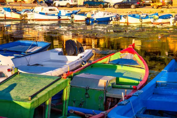 Photo of Colorful boats, moored in the marina of the town of Sozopol