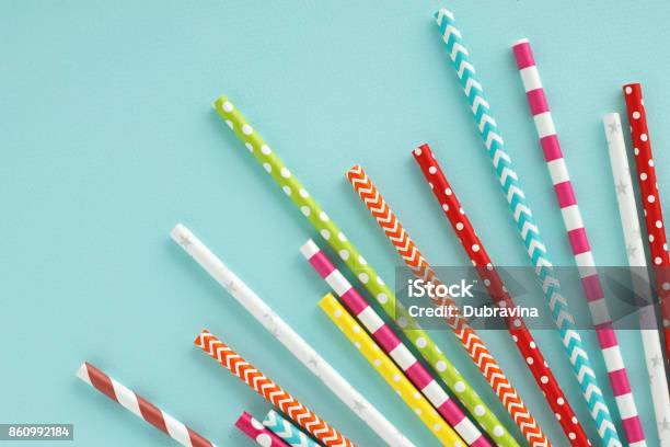 Colorful Paper Drinking Straws On Blue Background Stock Photo - Download Image Now - Drinking Straw, Paper, Above