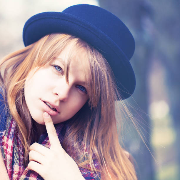 istock Young Thinking Woman Outdoors 860993116