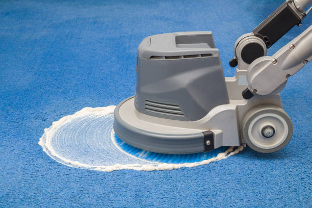 Blue carpet chemical foaming, rubbing and cleaning with professionally disk machine. Early spring regular cleanup. Cleaning service concept. Blue carpet chemical foaming, rubbing and cleaning with professionally disk machine. Early spring regular cleanup. Cleaning service concept. carpet stock pictures, royalty-free photos & images