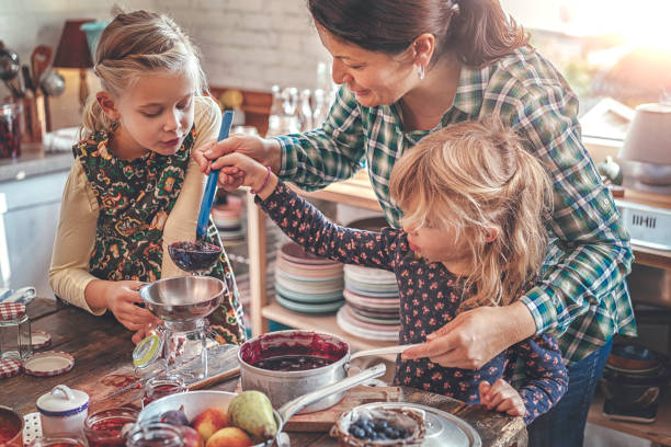 istock Preparing Homemade Blueberry Jam and Canning in Jars 860999464
