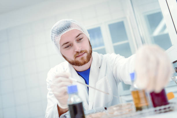 Scientist Doing Tests in Water Bottling Factory