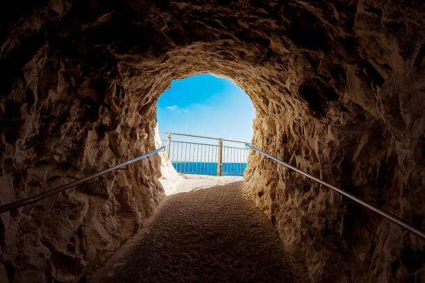 istock A cave exit  and blue sky at Rosh Hanikra - Israel 861019148