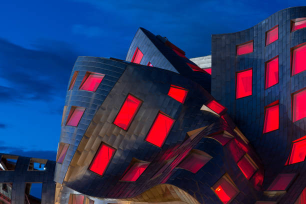 Lou Ruvo Center for Brain Health at night Las Vegas, Nevada, USA - August 4, 2017: Architectural abstract of the Lou Ruvo Center for Brain Health at twilight in downtown Las Vegas frank gehry building stock pictures, royalty-free photos & images