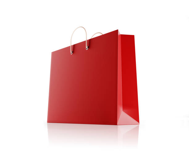 Red shopping bag isolated on white background. Horizontal composition with copy space and clipping path. Great use for shopping related concepts.