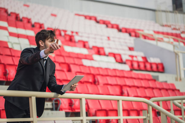istock Sports coach on the bleachers 861029886
