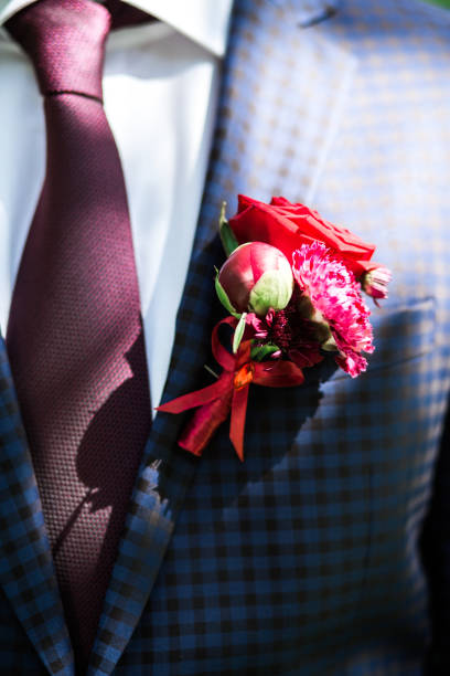 istock Groom in suit with boutonniere, daylight 861030386