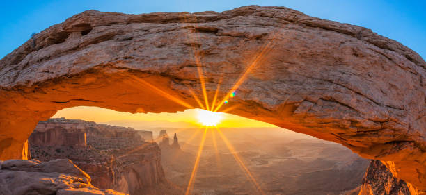 istock Famous sunrise at Mesa Arch 861031552