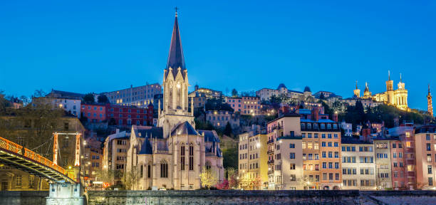 Famous Saint-Georges church Famous Saint-Georges church in Lyon with Saone river at night george south africa stock pictures, royalty-free photos & images