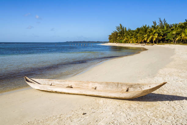 istock Wooden canoe on the tropical beach 861034496