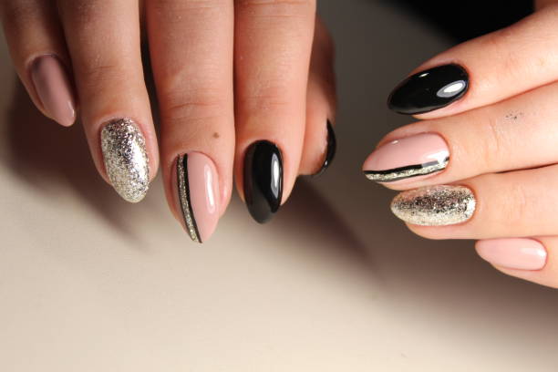 istock Nails black and coffee color with abstraction 861040546