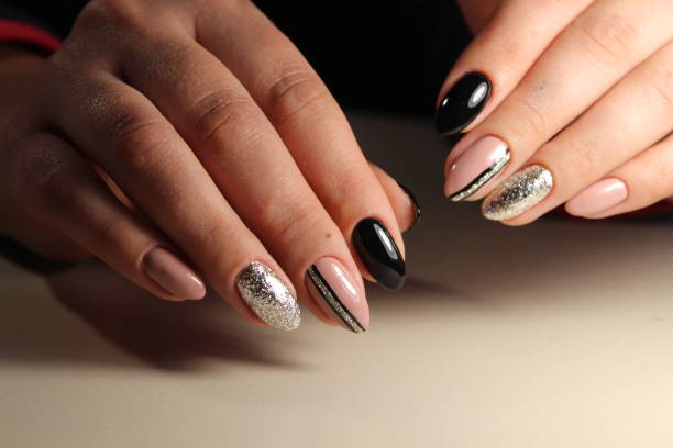 istock Design manicure black and beige nails with abstraction 861040560