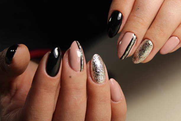 istock Design manicure black and beige nails with abstraction 861040590