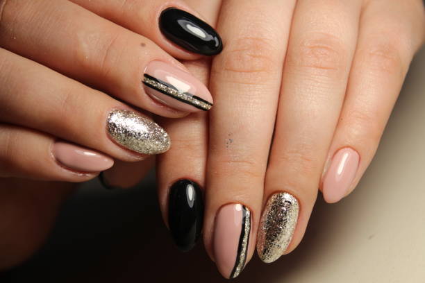 istock Design manicure black and beige nails with abstraction 861040740