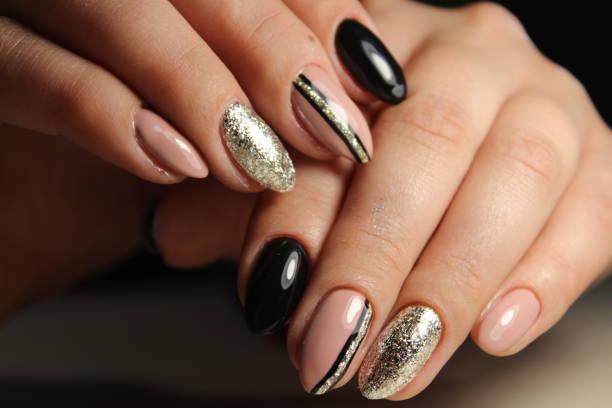 istock Design manicure black and beige nails with abstraction 861040758