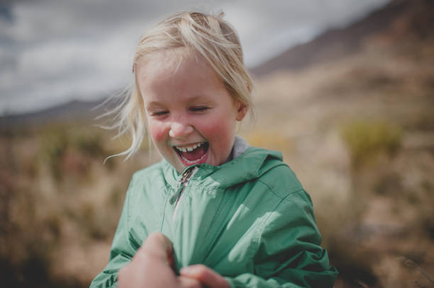 istock Tickle laughing toddler screaming withy delight 861041212