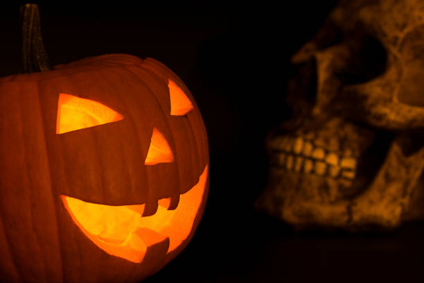 istock hallowen pumpkin and skull 861043896