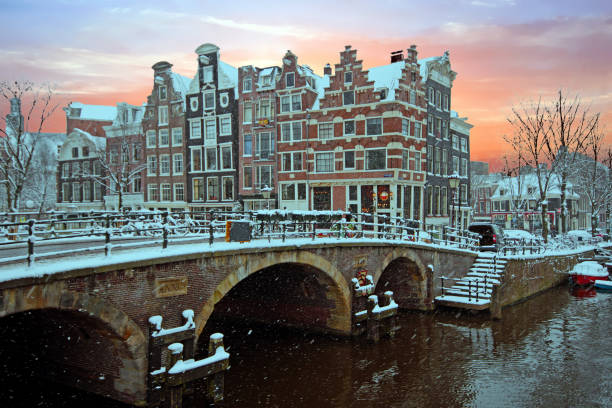 istock Snowy Amsterdam in the Netherlands in winter at sunset 861044312