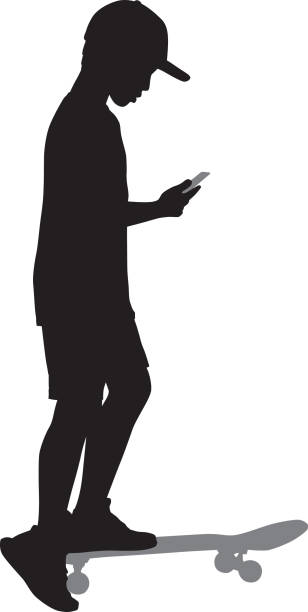 ilustrações de stock, clip art, desenhos animados e ícones de boy on skateboard looking at smart phone - skateboarding skateboard silhouette teenager