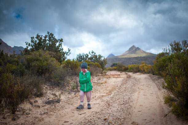 istock Sad young girl walking and crying in nature 861047506