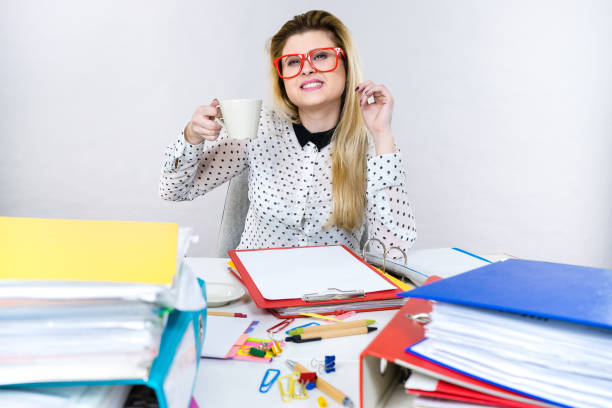 istock Happy woman at office drinking hot coffee 861051554
