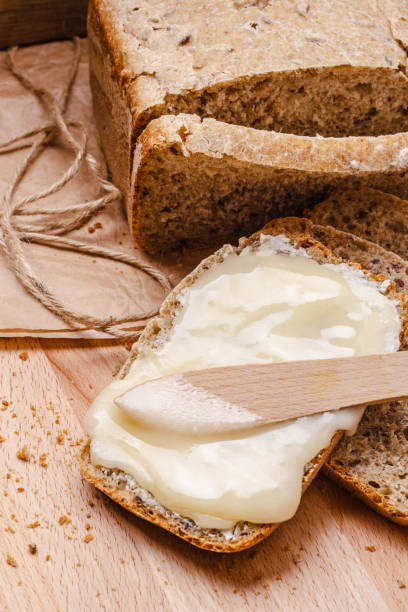 istock Still life fresh bread with butter and honey 861054066