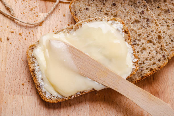 istock Still life fresh bread with butter and honey 861054164