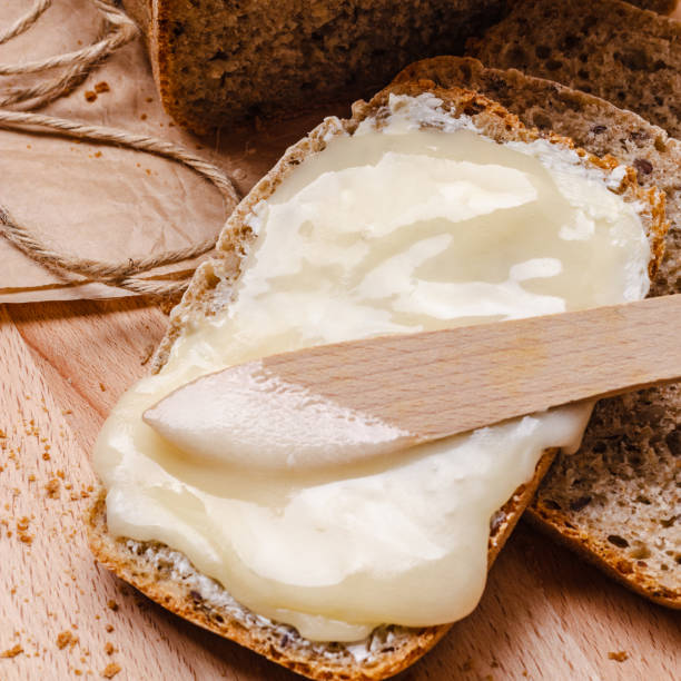 istock Still life fresh bread with butter and honey 861054564