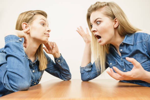 istock Two women having argue fight 861054642