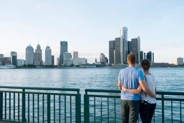 istock Young couple looking at Detroit skyline 861057826