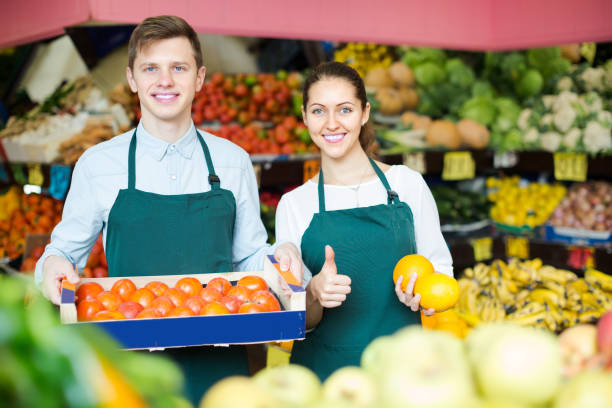 istock Stuff in apron selling sweet oranges, lemons and tangerines 861071124