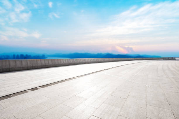 istock empty marble floor with modern city near long river 861071366