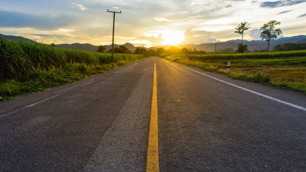istock The gold light beams sunset on the road. 861071468