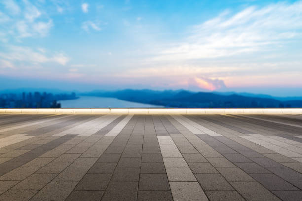 istock empty marble floor with modern city near long river 861072338
