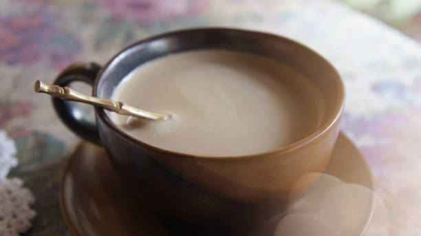 istock Cup of coffee (latte) on the table. Soft and vintage background. 861080266