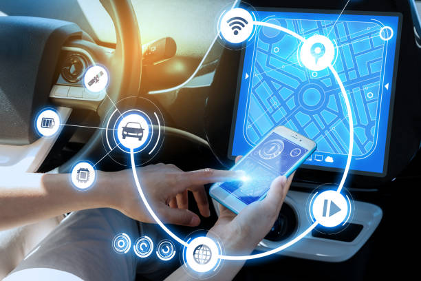 wireless communication between smart phone and car instrument panel. autonomous car. wireless communication between smart phone and car instrument panel. autonomous car. car audio equipment stock pictures, royalty-free photos & images