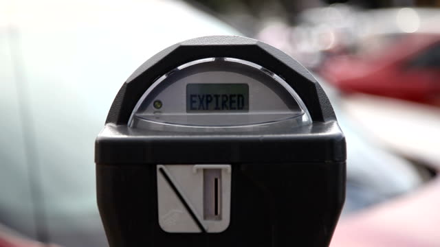 expired parking meter flashing