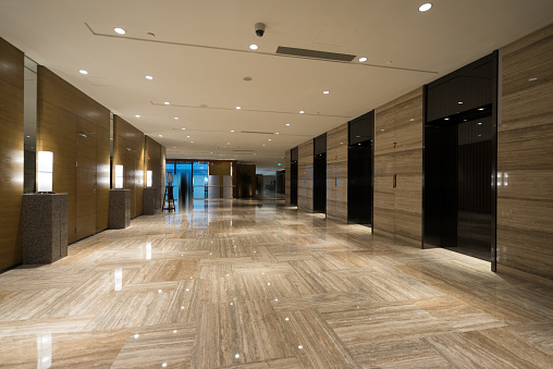 Luxury lobby interior.With crystal lamp,bing hall, marble floor, french sash,mosaic tile,comfortable sofa, etc.