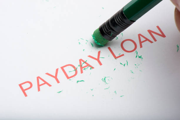 istock Pencil Erasing the Word 'Payday Loan' on Paper 861108536