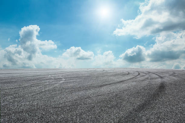 istock Asphalt road circuit and sky clouds with car tire brake 861111728