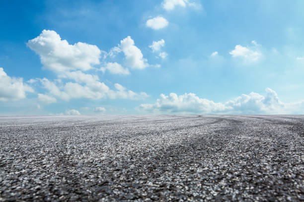 istock Asphalt road circuit and sky clouds with car tire brake 861111912