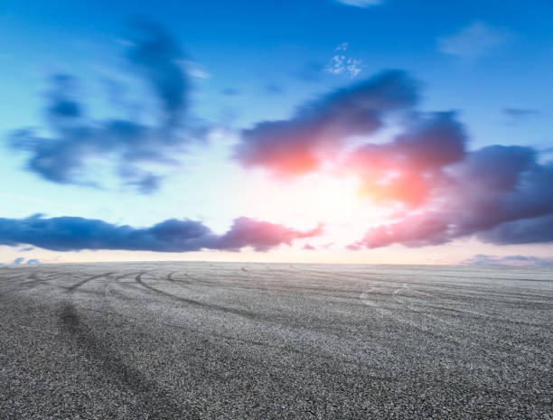 istock Asphalt road circuit and sky sunset with car tire brake 861114036