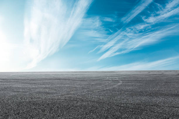 istock Asphalt road circuit and sky clouds with car tire brake 861114106