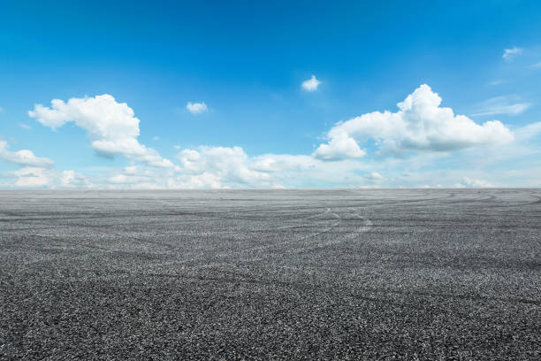 istock Asphalt road circuit and sky clouds with car tire brake 861114478