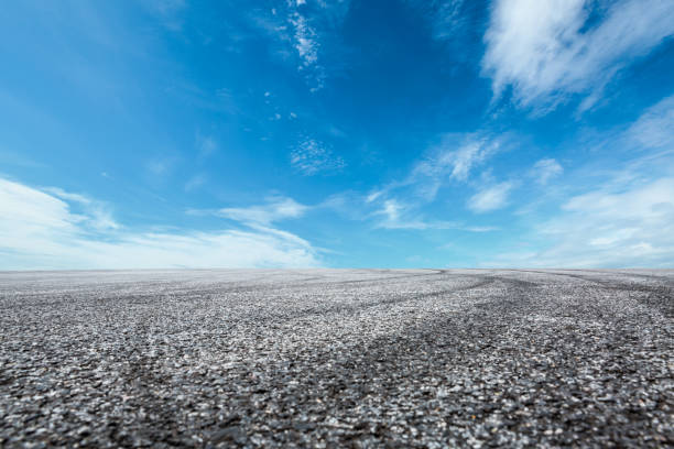 istock Asphalt road circuit and sky clouds with car tire brake 861114626