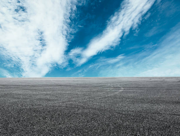 istock Asphalt road circuit and sky clouds with car tire brake 861117714