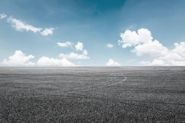 istock Asphalt road circuit and sky clouds with car tire brake 861117886