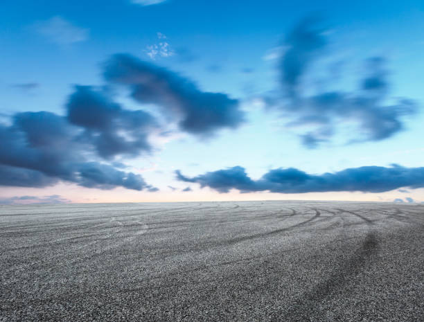 istock Asphalt road circuit and sky sunset with car tire brake 861118472