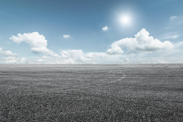 istock Asphalt road circuit and sky clouds with car tire brake 861119626